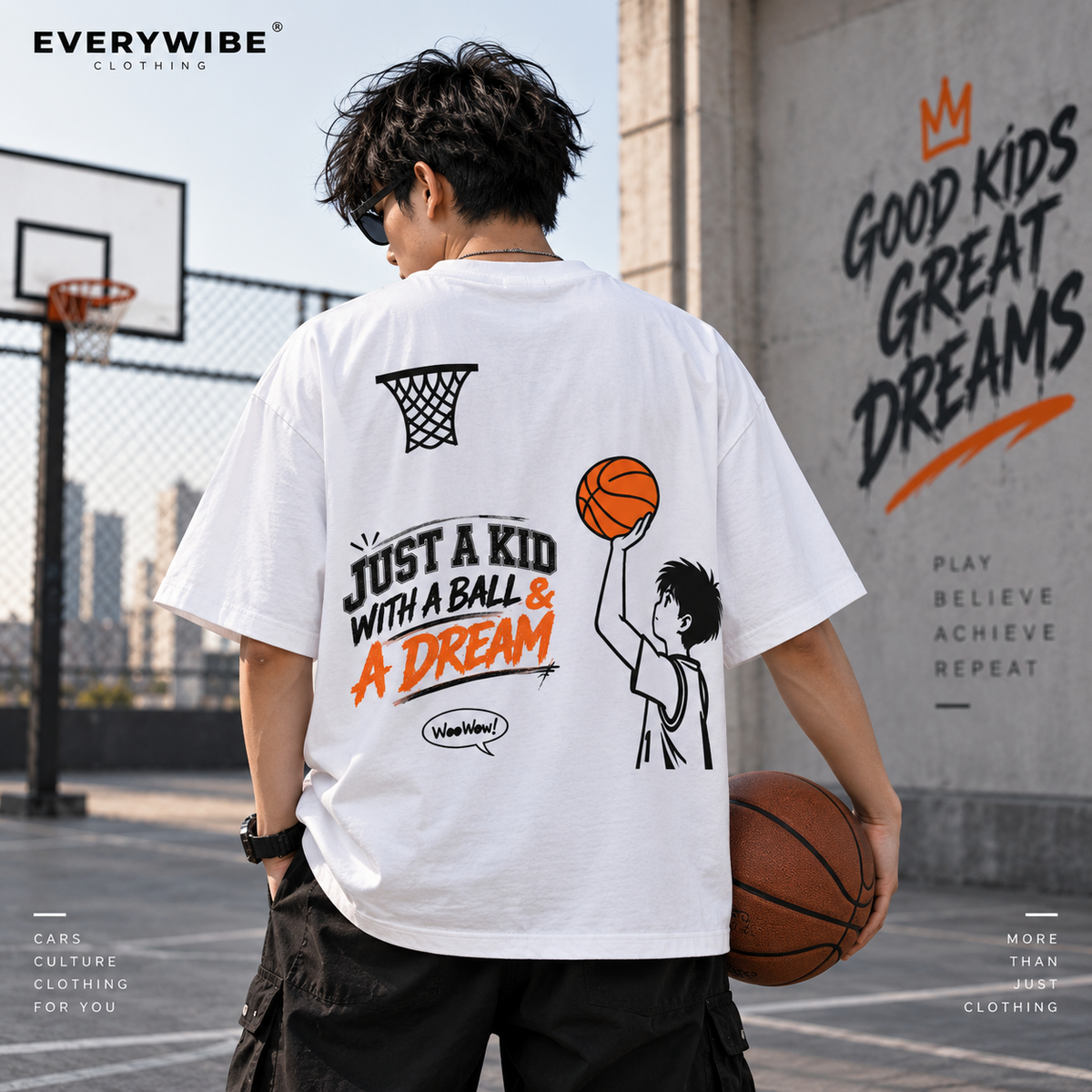 Everywibe white oversized basketball graphic T-shirt styled on model at a basketball court
