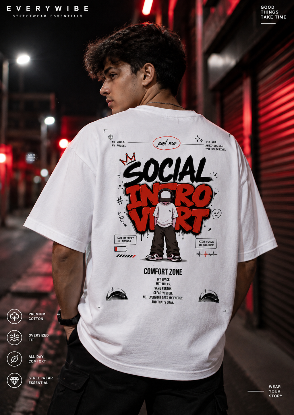 Everywibe Social Introvert white oversized graphic T-shirt styled on male model at night